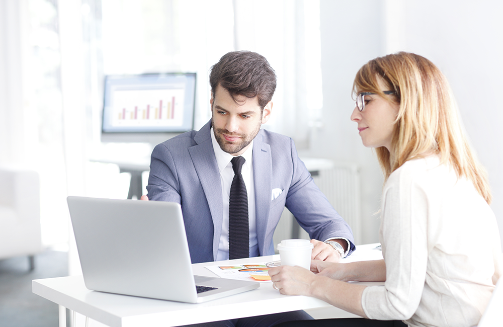 Financial Advisor and Client discussing retirement savings