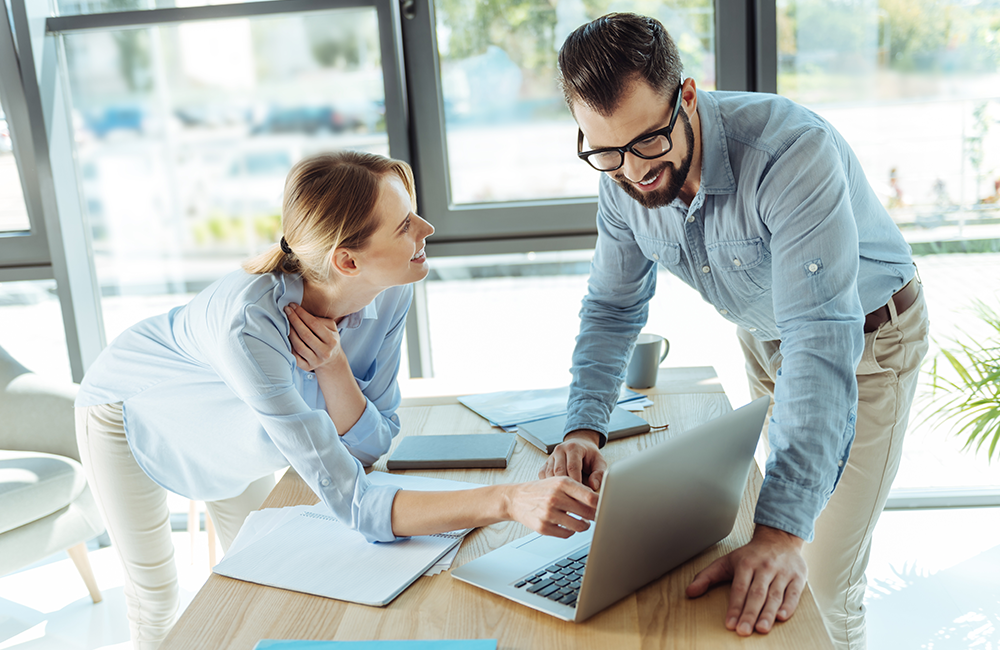 Man and Women calculating the income they want for a secure retirement